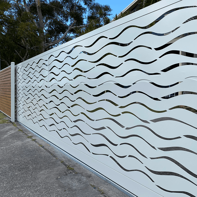 laser cut driveway gate with wave pattern
